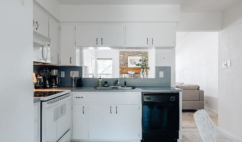 Kitchen is equipped with all appliances you might need: two-side fridge, electric oven, dishwasher, microwave, and more.