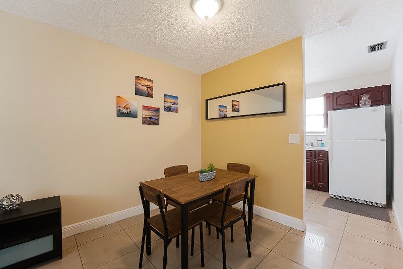 Cozy dining nook perfect for meals or remote work.