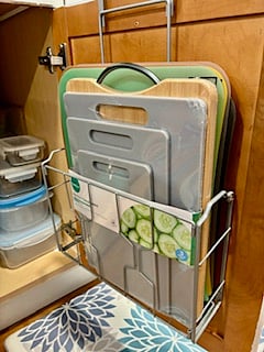 various cutting boards, food storage containers. new dish sponges, dishwashing soap etc