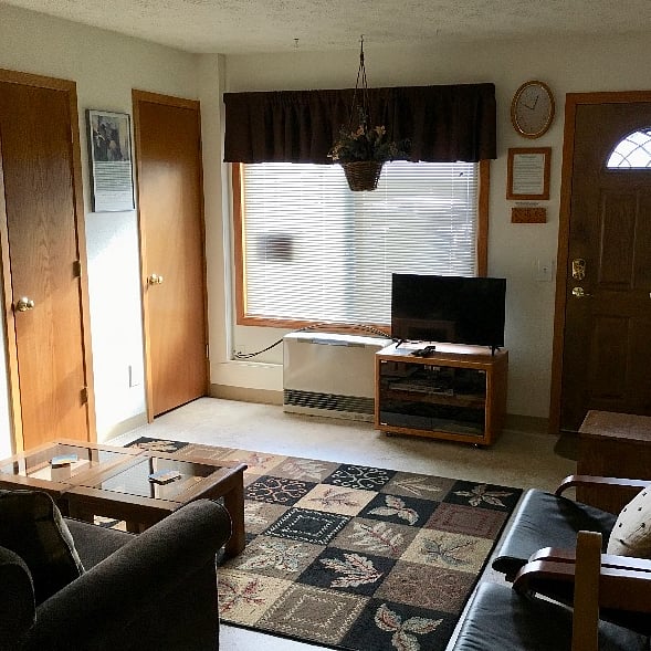 High quality louvered blinds to add daylight or hide it as needed.  Two doors, one to coat closet and other to 1st floor bathroom.  
