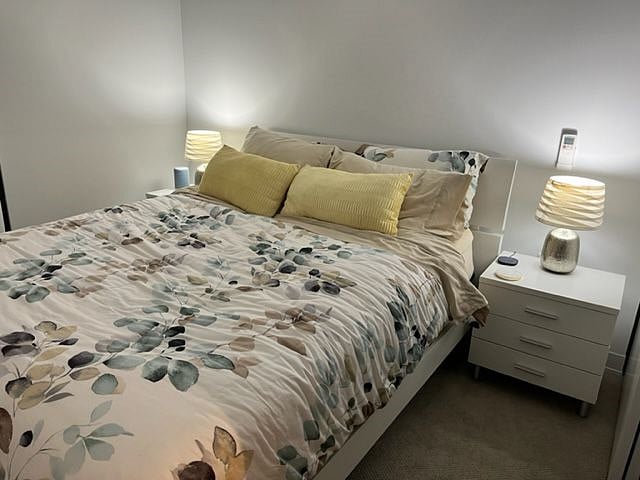 Queen size bed with moveable frame