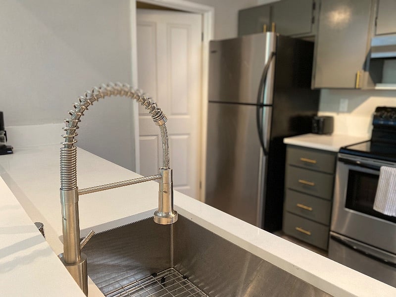 Enjoy all the new features, faucet large kitchen sink, crisp new countertops.