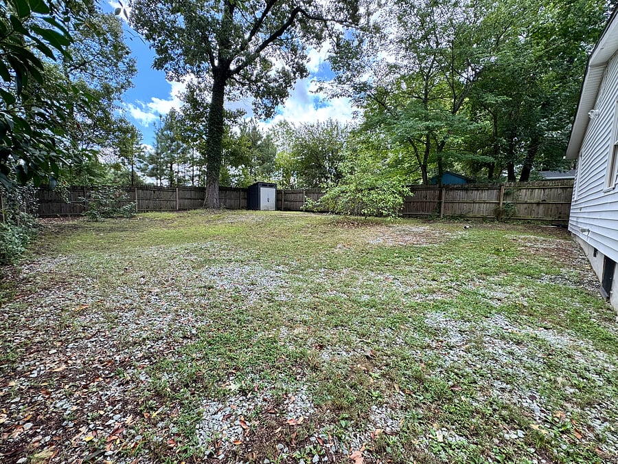 Spacious fully fenced backyard.