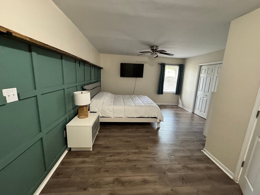Master bedroom with blackout curtain.