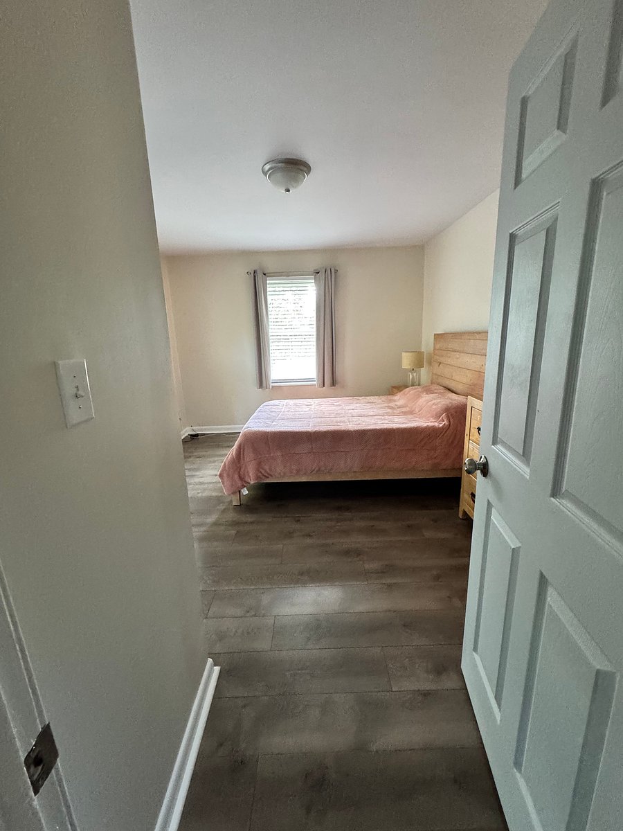 Second bedroom (1st guest room) with blackout curtain.