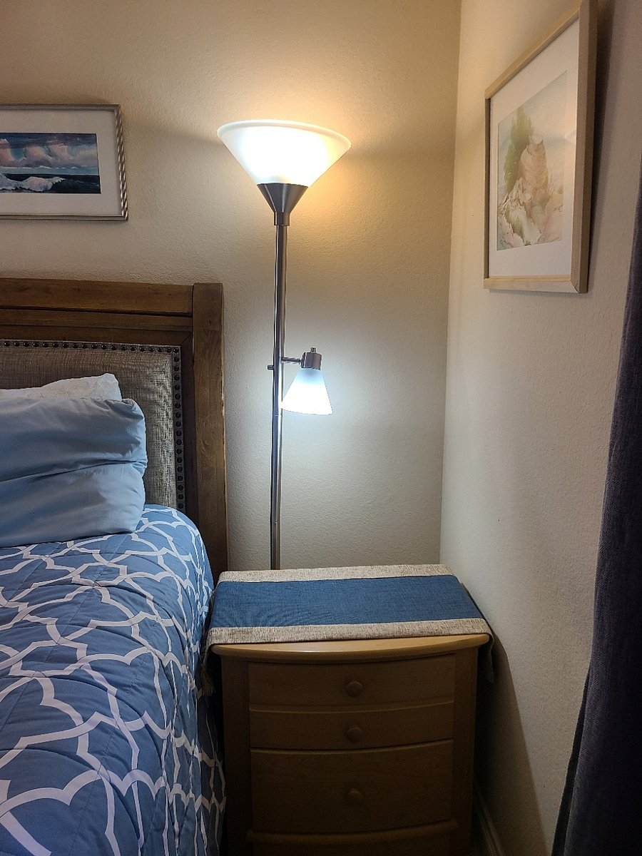 Generous Bedside stands on both sides of the bed