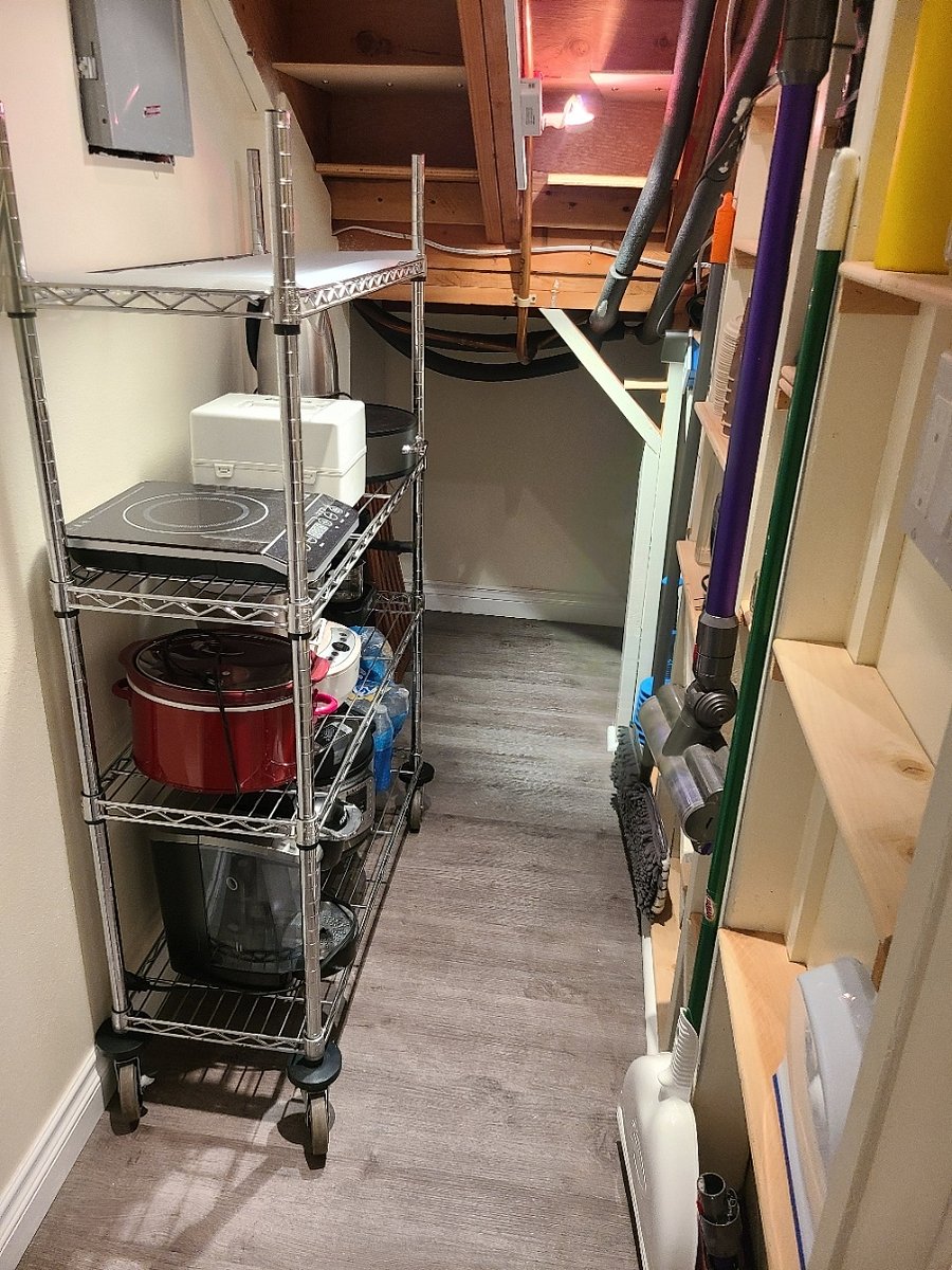 Extra Kitchen items and additional storage under the stairs