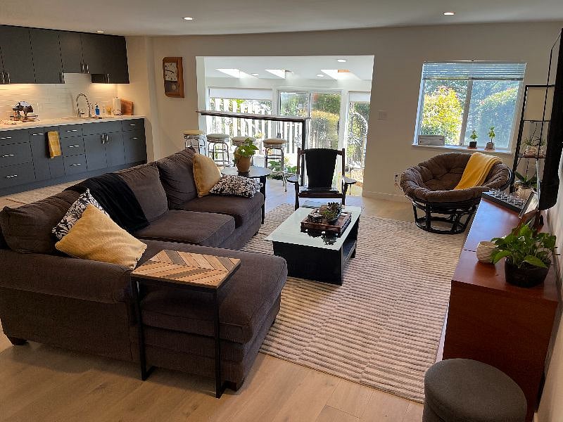 Lower level entertainment area and sun room.