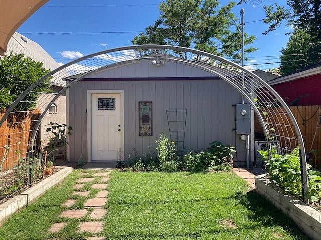 Backyard with detached 2-car garage