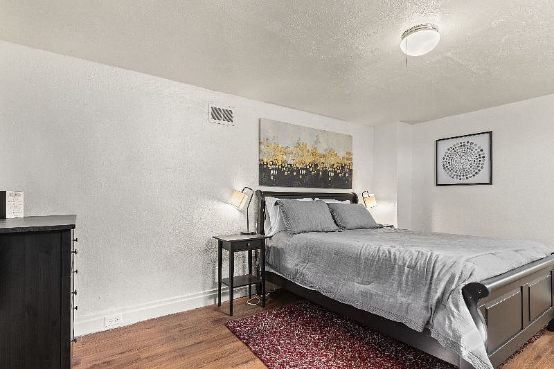 Queen bed with fresh sheets