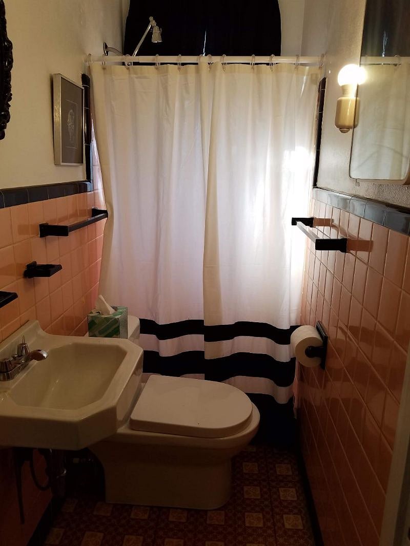 Yes, very small bathroom. There is a shower, no tub.