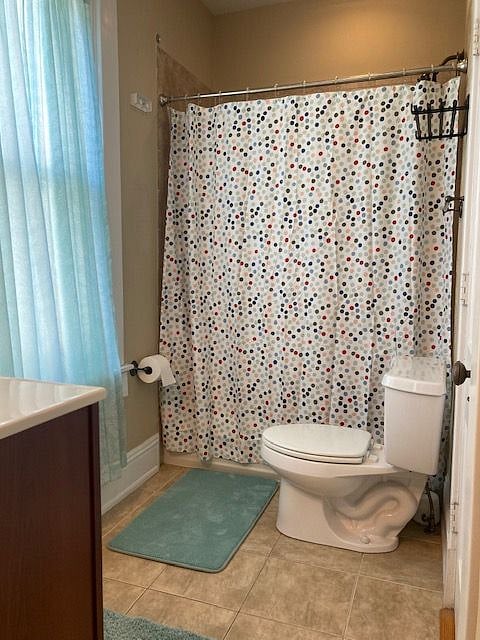 Bathroom 1 includes an entrance from Bedroom 1 and entrance from hallway. Full shower/tub.