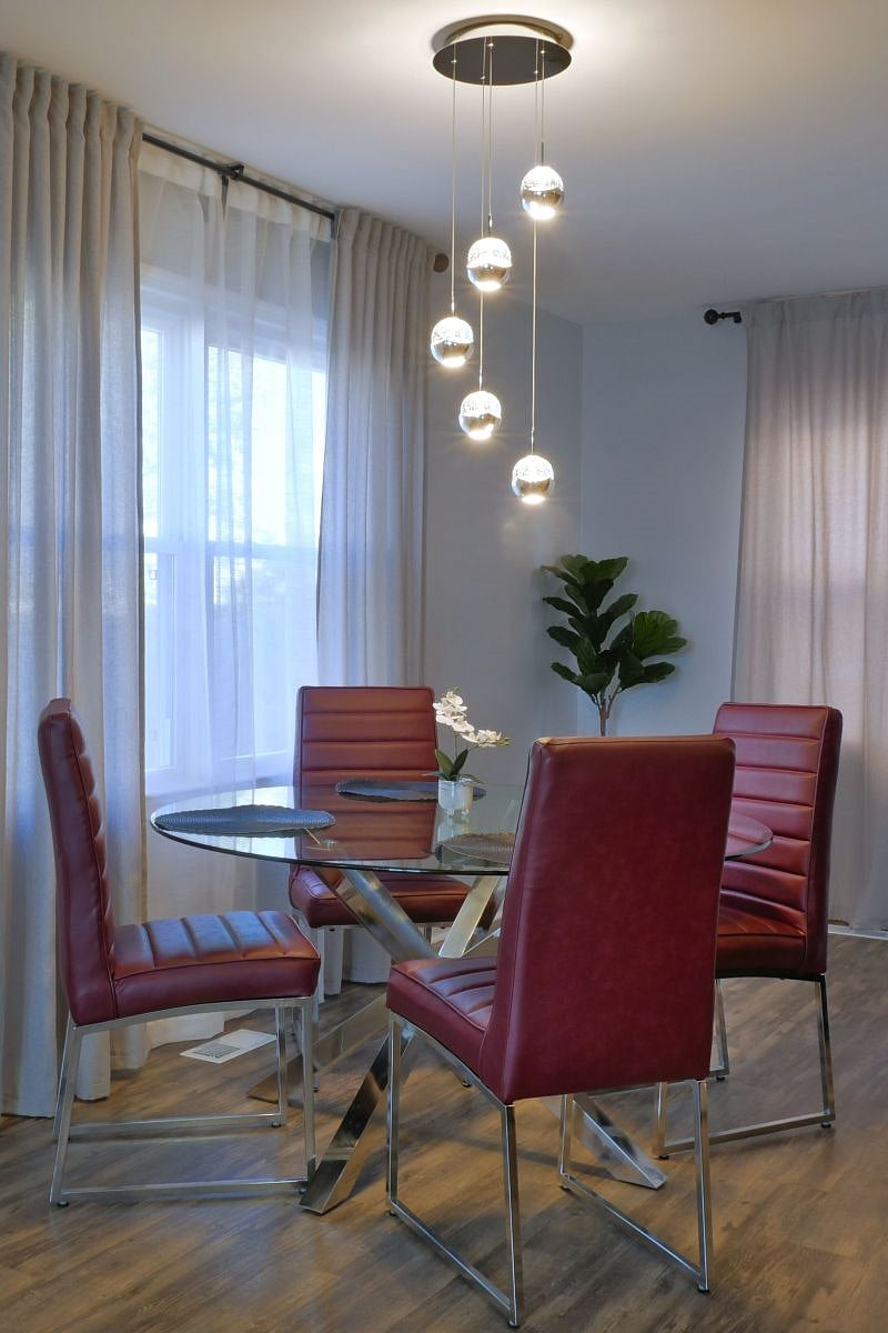 Modern dining area with comfortable sitting for up to four people.