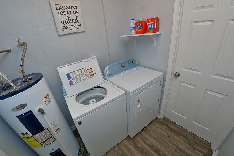Full size washer and dryer in the laundry room.