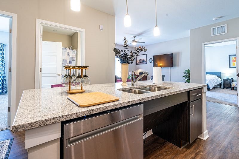 Kitchen.  Stainless steel dishwater keeps all of your kitchen items clean and available when you need it.  Plenty of counter space to prepare food and entertain.  Pull  up a seat at the island!