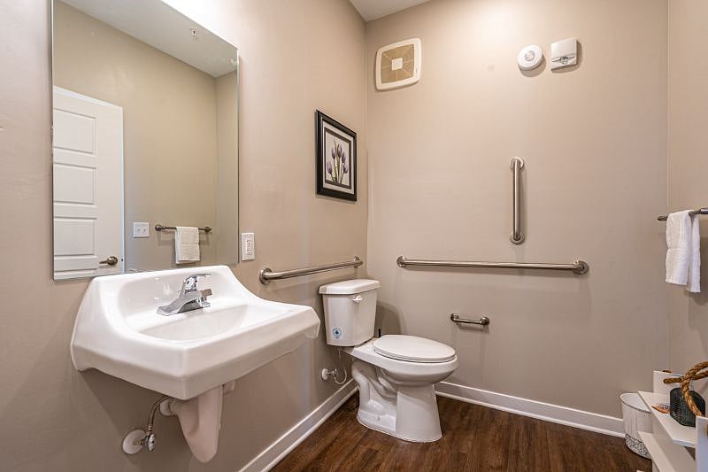 Master Bathroom.  ANSI compliant with hand rails for those requiring assistance.