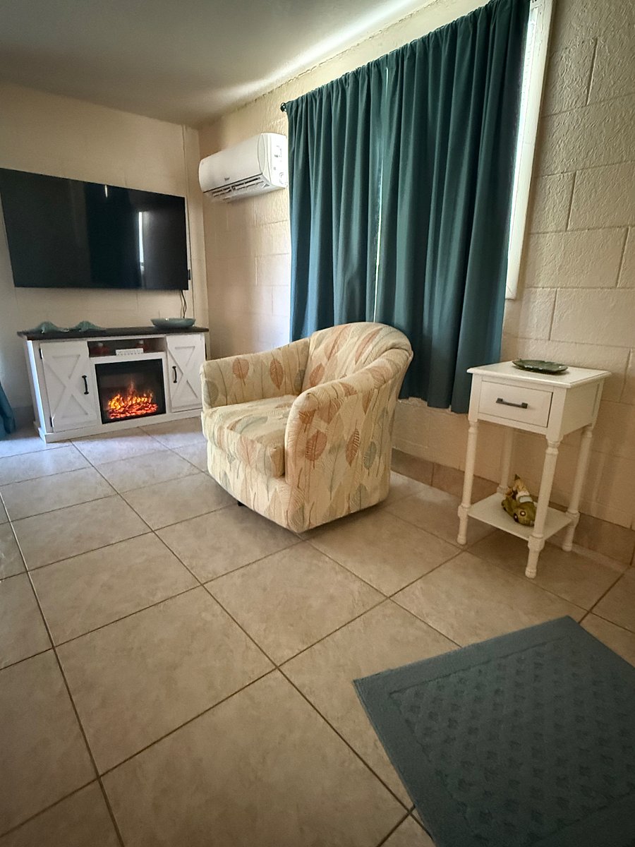 Cozy swivel chair so you can enjoy the electric fireplace
