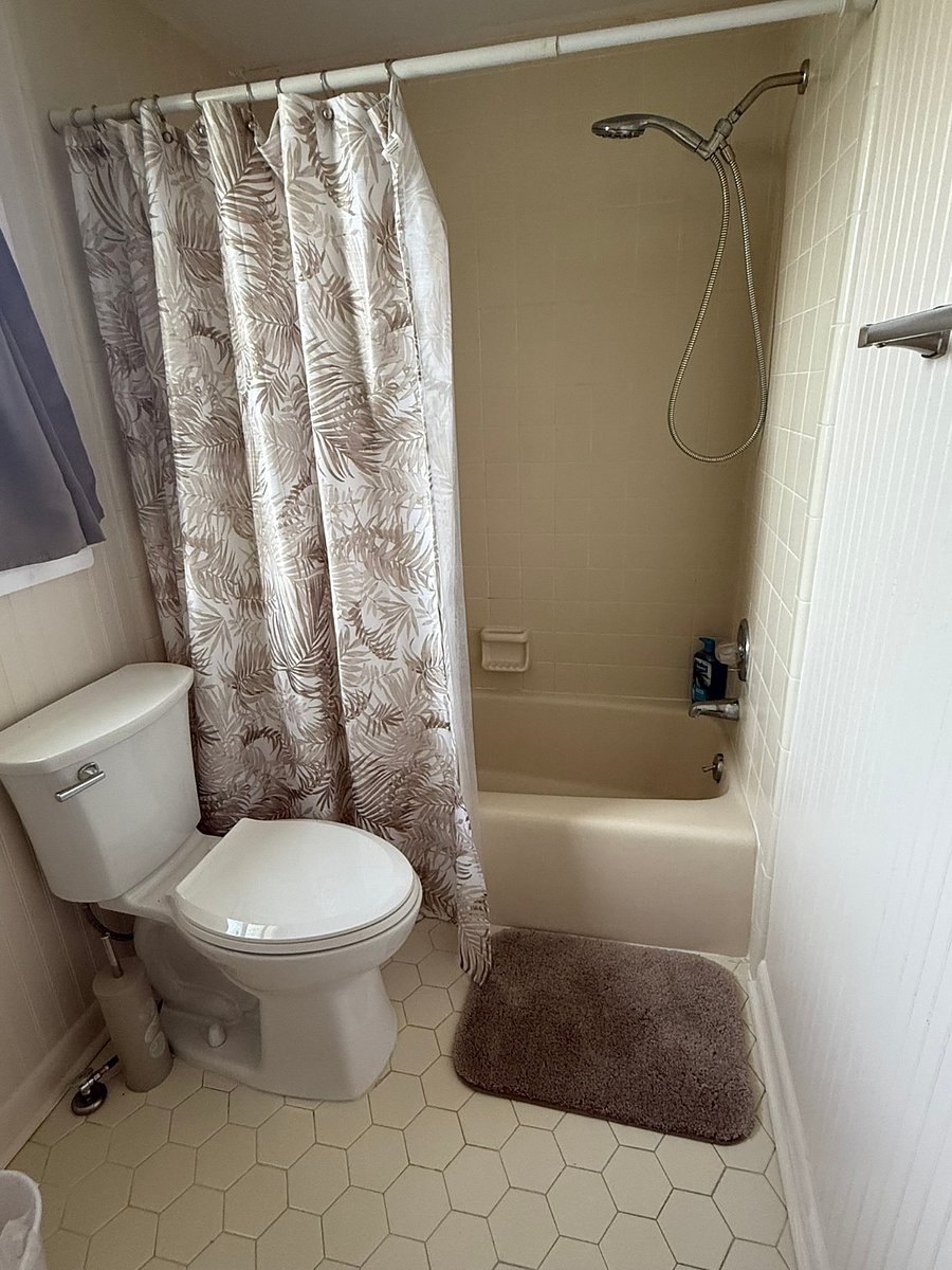 Tub shower combo with hand held shower