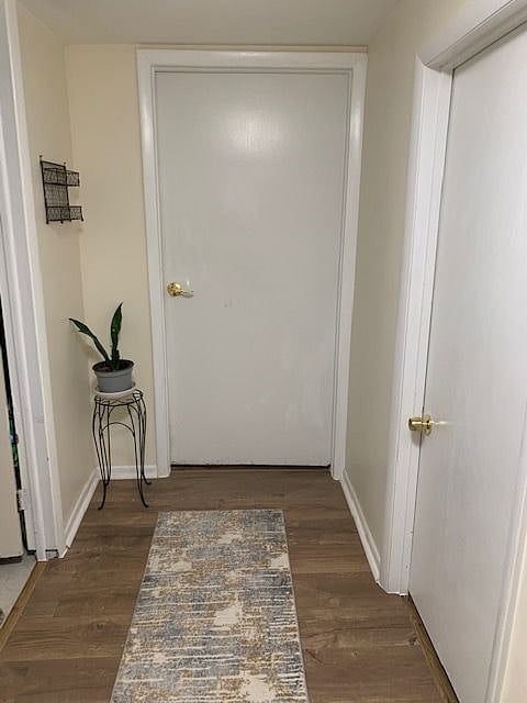 Secure entrance to private apartment. Laundry room on the left.