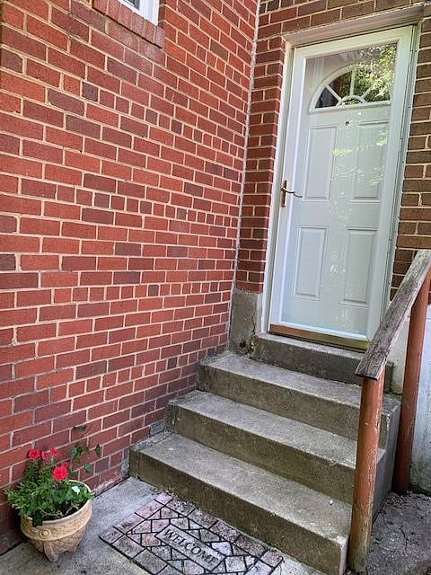 Separate side entrance to apartment.