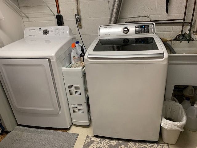Shared laundry room right outside apartment.