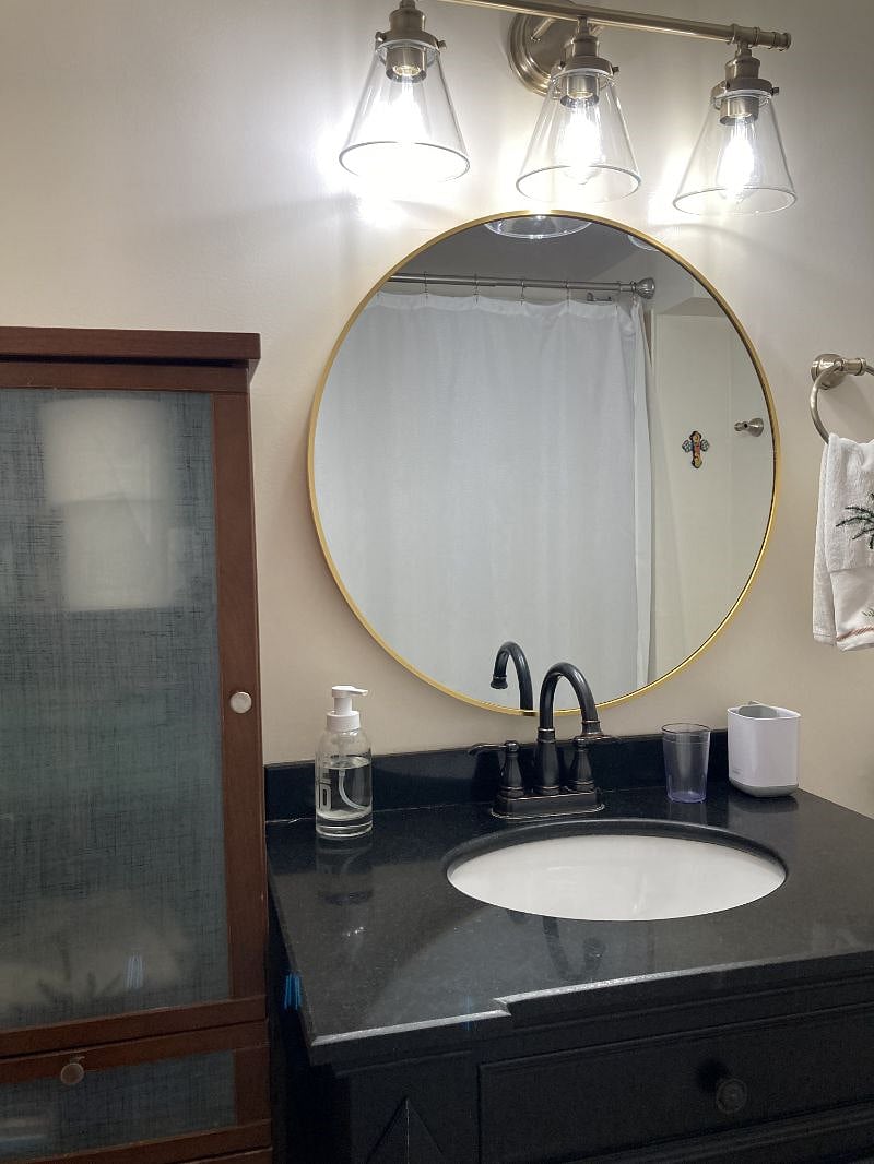 Ample storage in the bathroom.