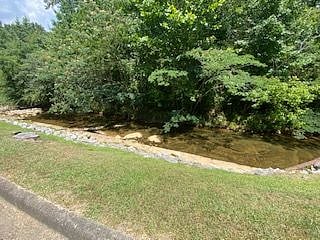 A peaceful creek directly across the street.