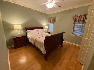 Guest room with such comfortable looking bedding it makes you want to jump right in bed!
