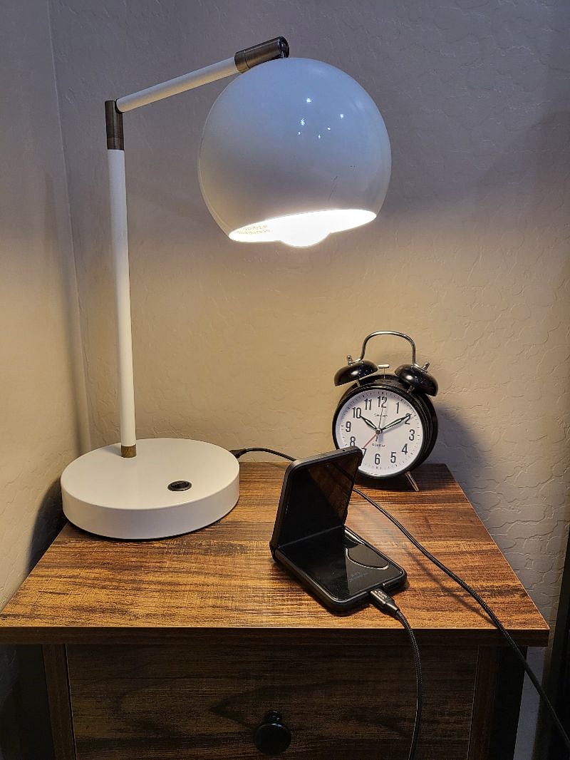 Two end tables with reading lights on both sides which includes a usb plug for charging....