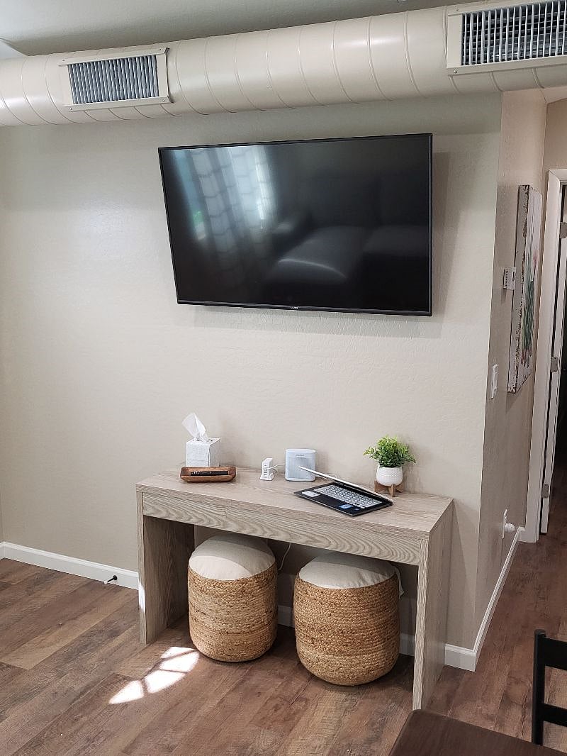 Hanging smart tv, table/work station, speaker box for your enjoyment