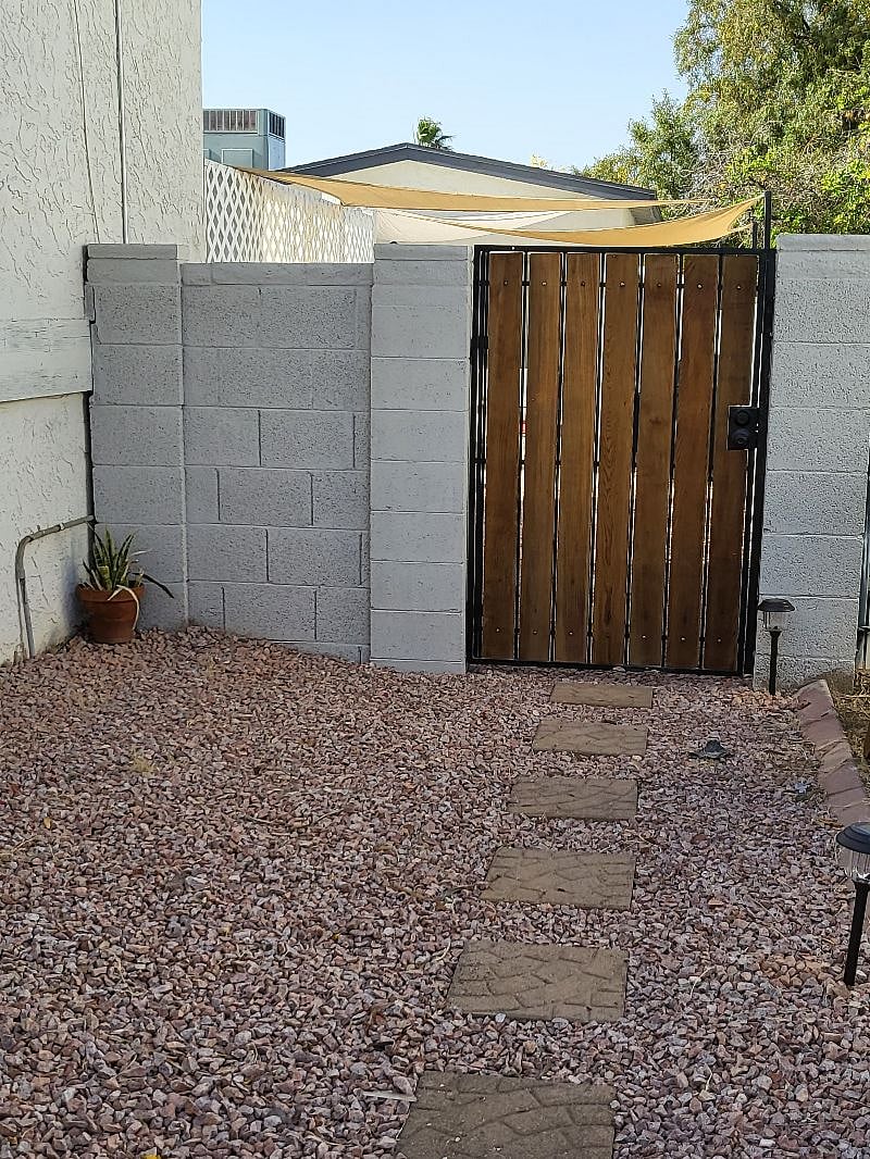Gate entrance to the house, must have gate combination and keys.