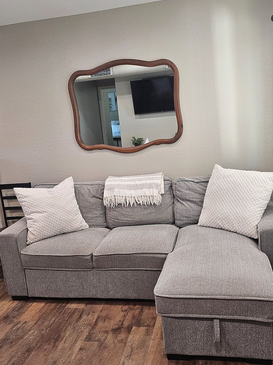 Sofa sleeper with spare linens and pillows