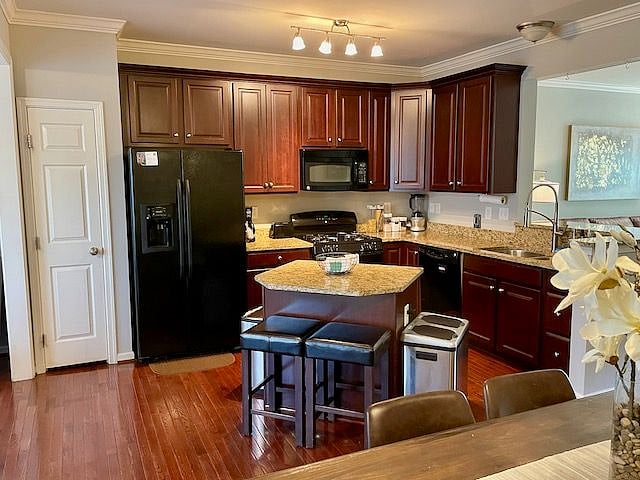 The large kitchen with lots of space to prepare your meals -- and it comes fully stocked with everything you will need to cook and serve!