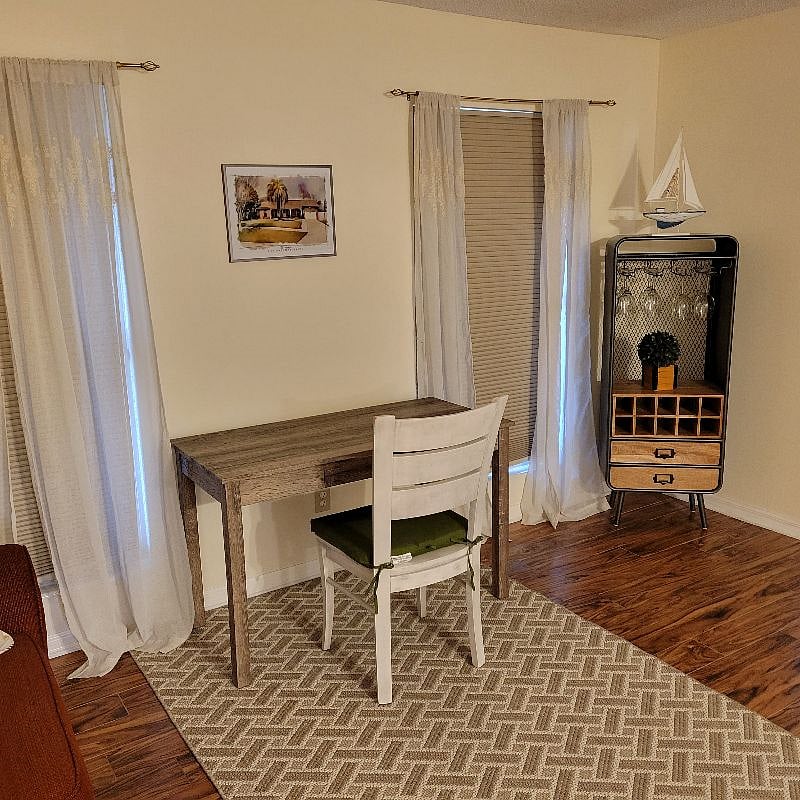 Workspace in the living room adjacent to the dinning room.
