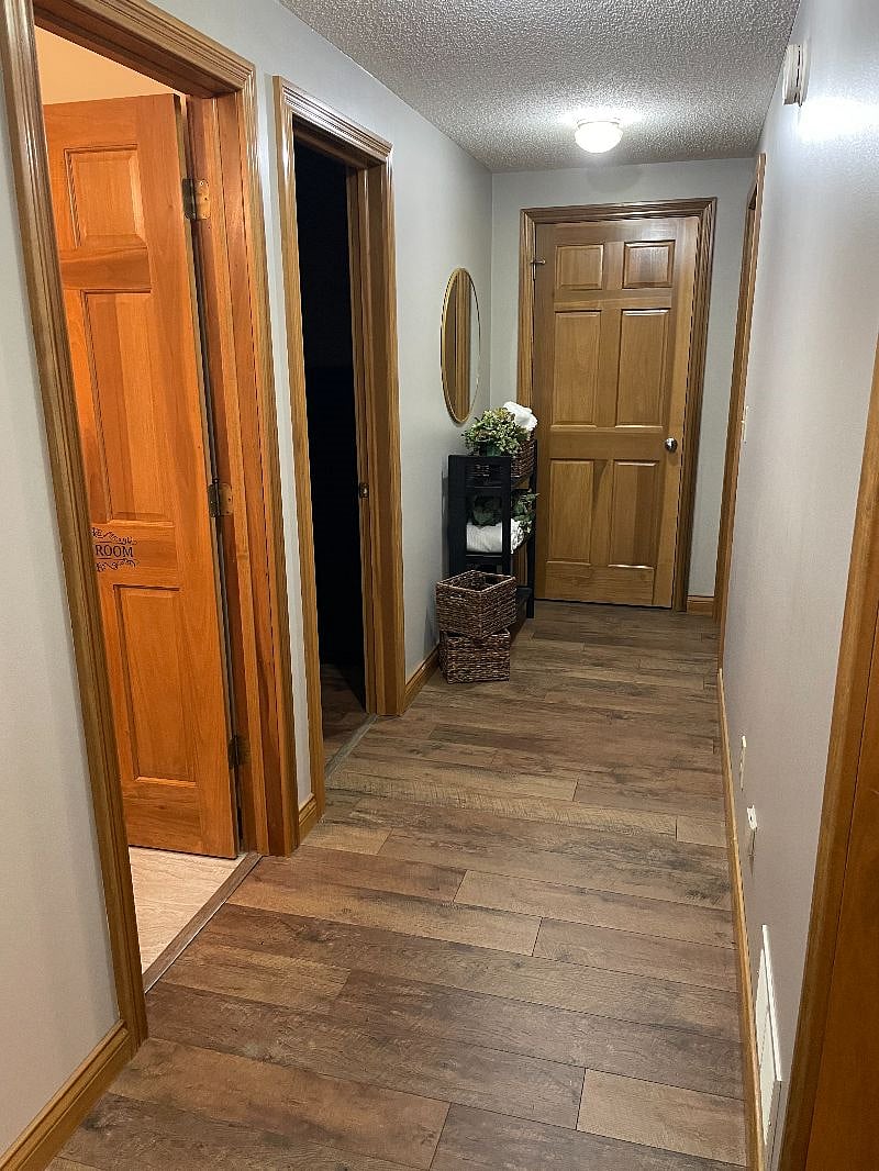 hall area with 2 separate bedrooms