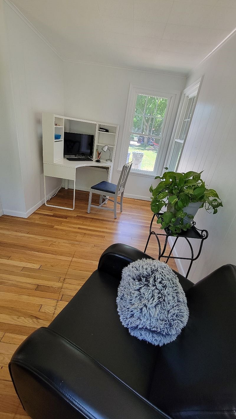 Open office / reading nook off the main living area. Completely surrounded by windows.