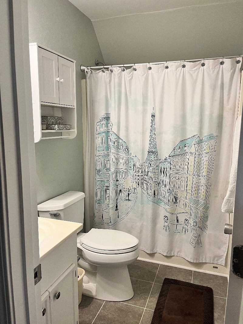 There is a private bathroom with a tub/shower.