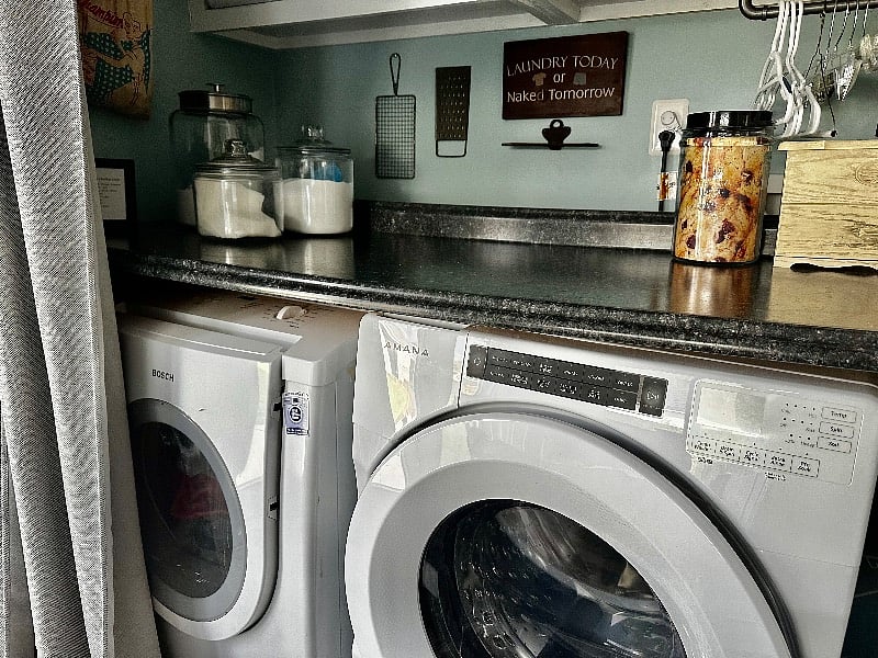 The laundry is in the kitchen and is complete with all you need to keep your clothing clean!