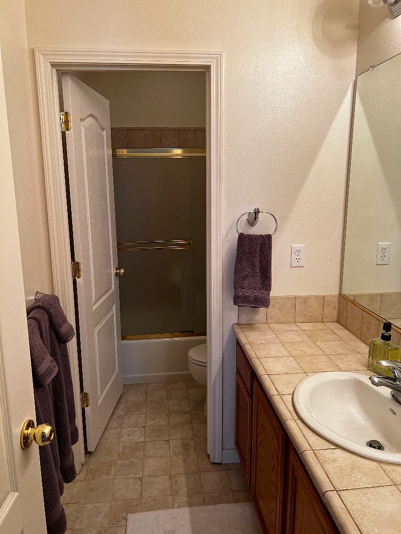 Bathroom with separate shower area