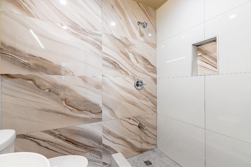 Shower with surround porcelain wall to ceiling