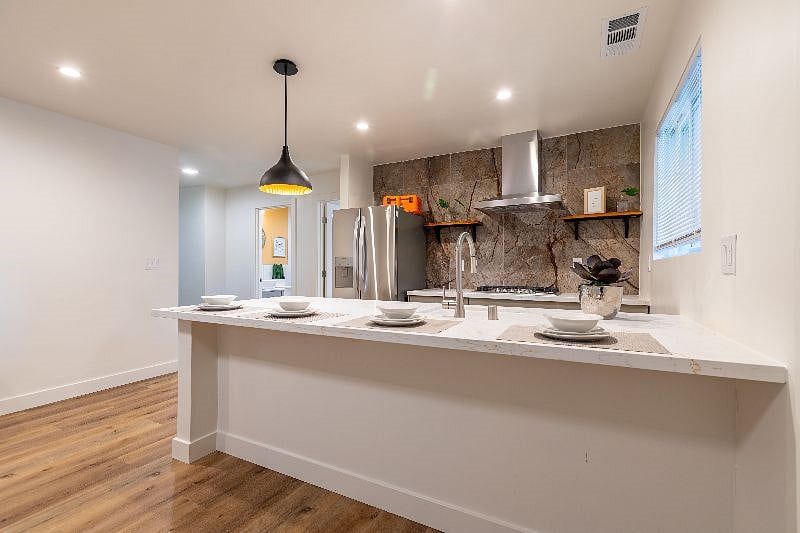 Full kitchen with stove, dishwasher, air fry, microwave