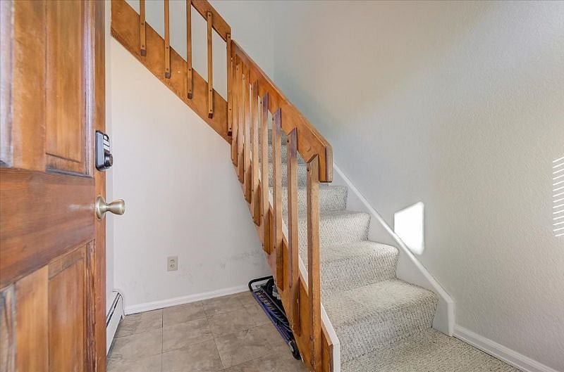 Condo Entry-- There is room for a bike or storage to the left of stairway.
