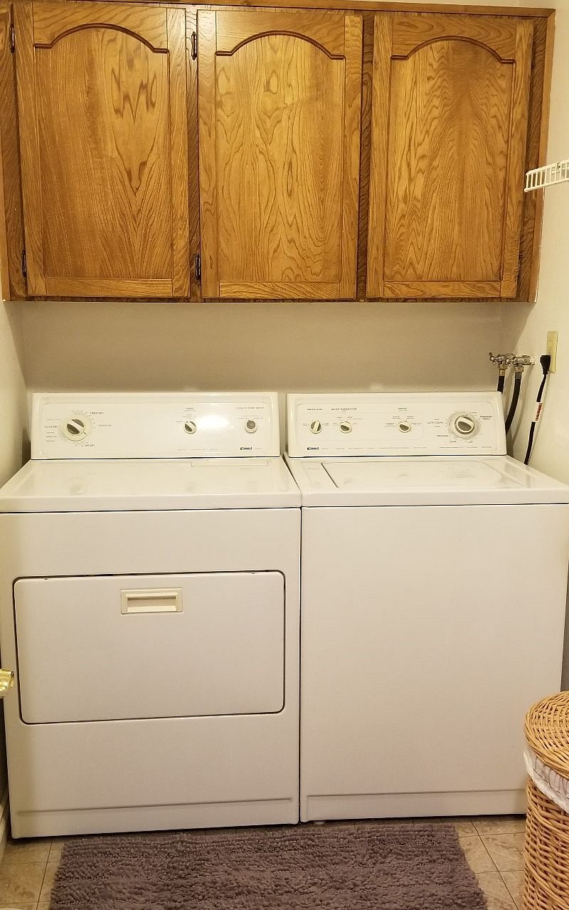 Laundry room with full-size appliances