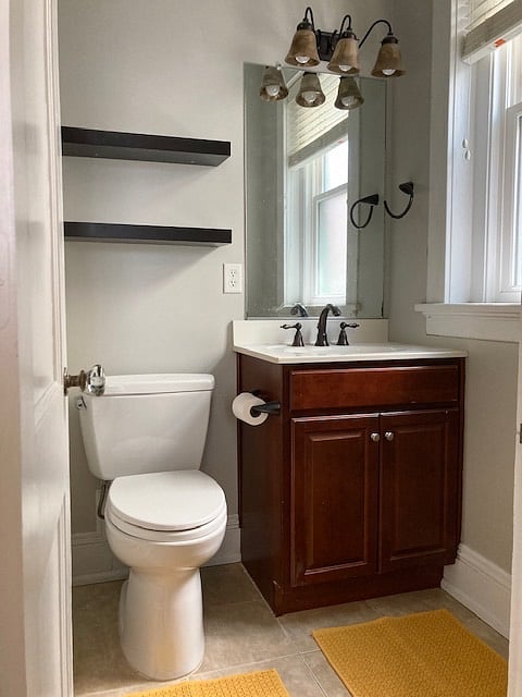 Full bath off master bedroom. With shower/tub and single sink.