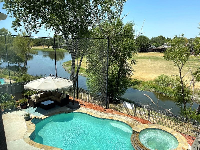 View of the pond and golf course from this guest room.