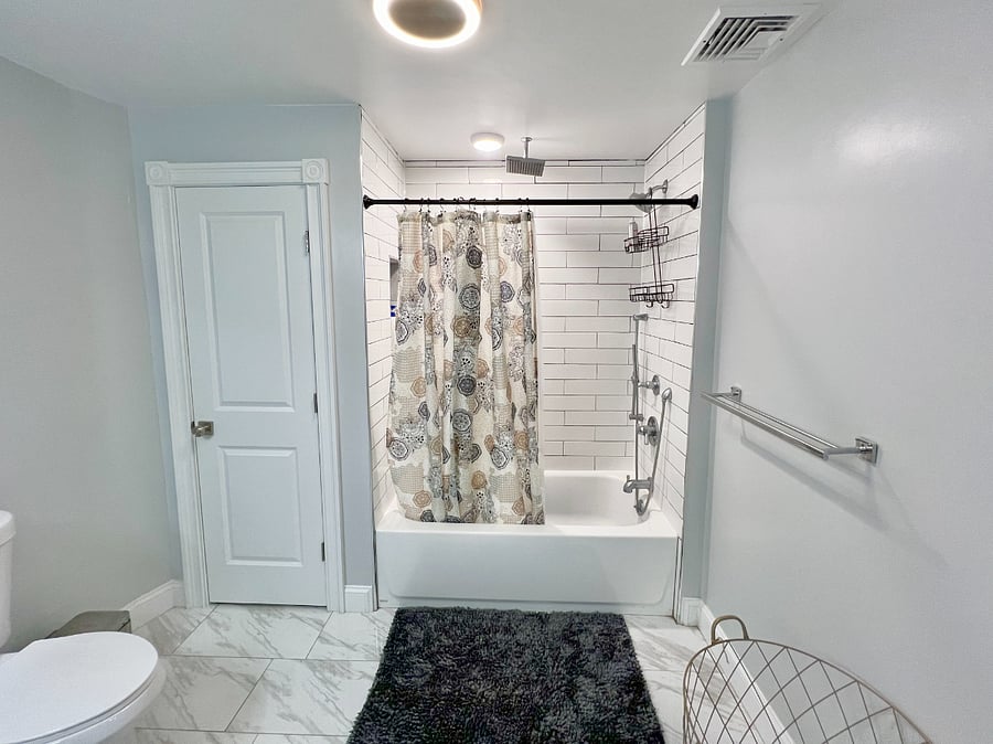 Shower includes fixed, rain, and handheld shower heads.