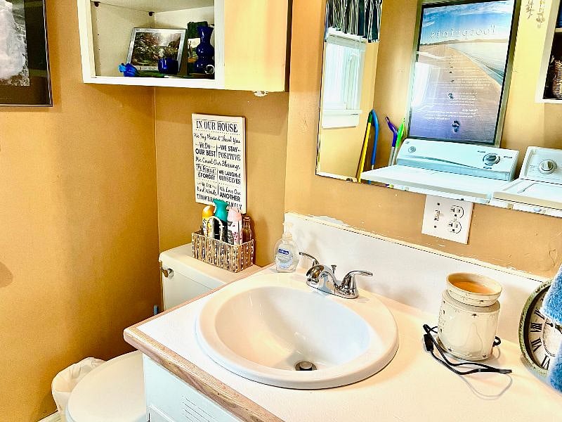 Bathroom, single sink with a shower