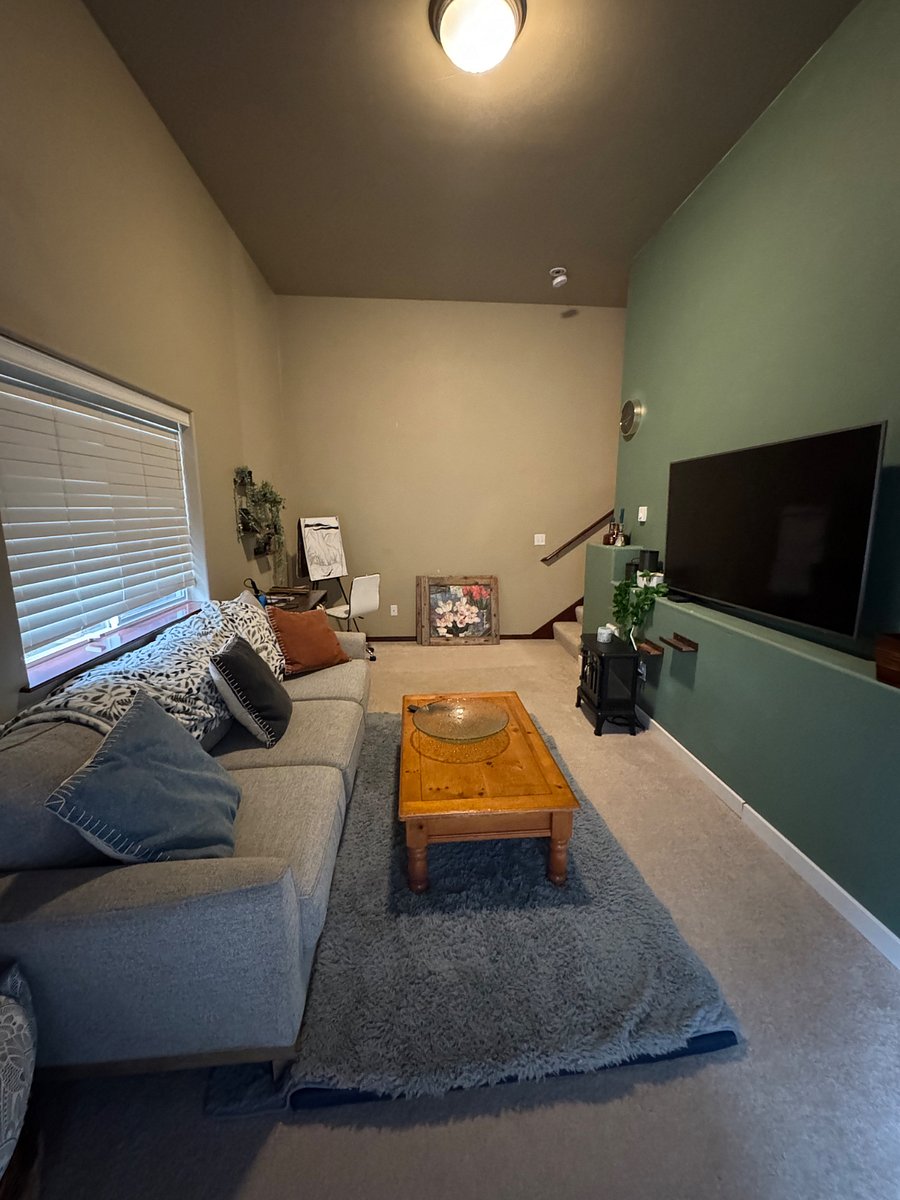 downstairs living room/hang space separate from the main and top floors