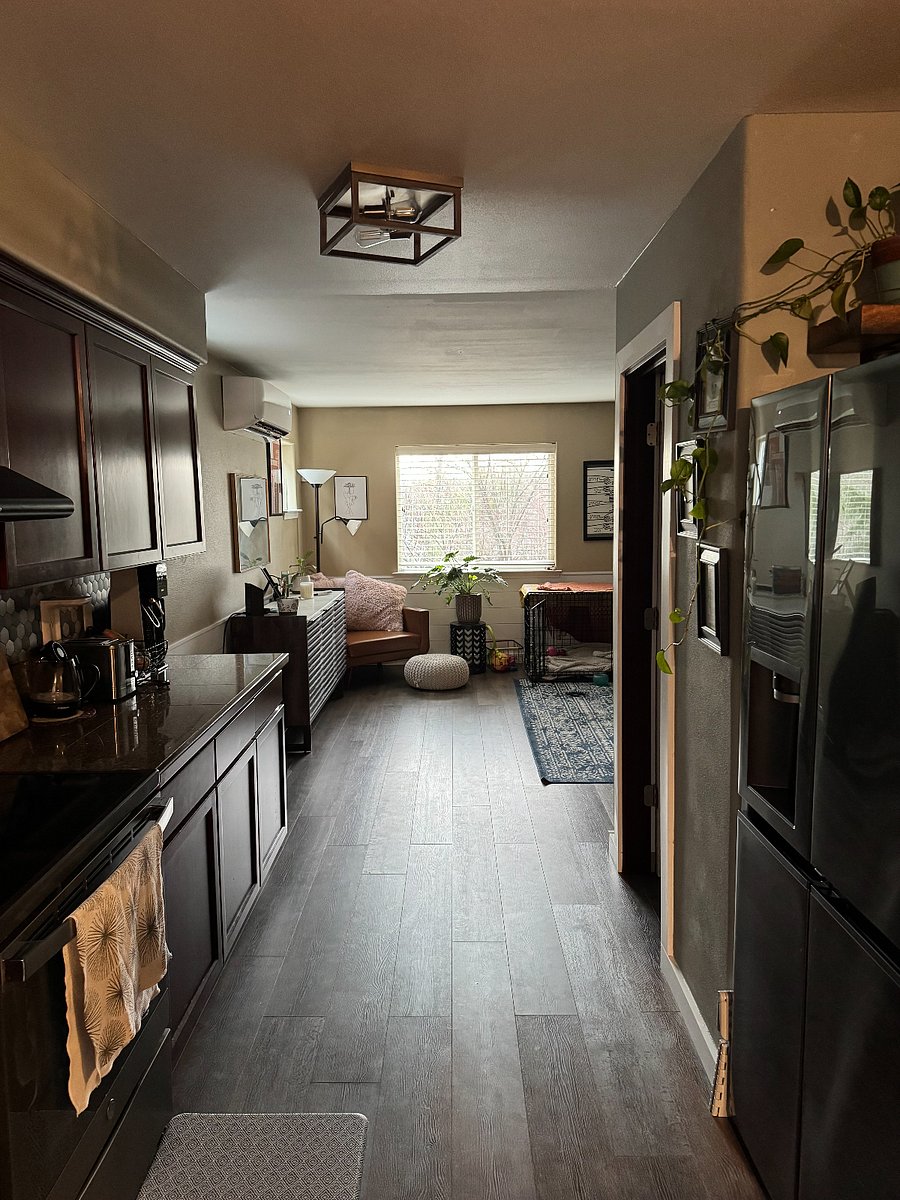 kitchen runs between dining room and living room
