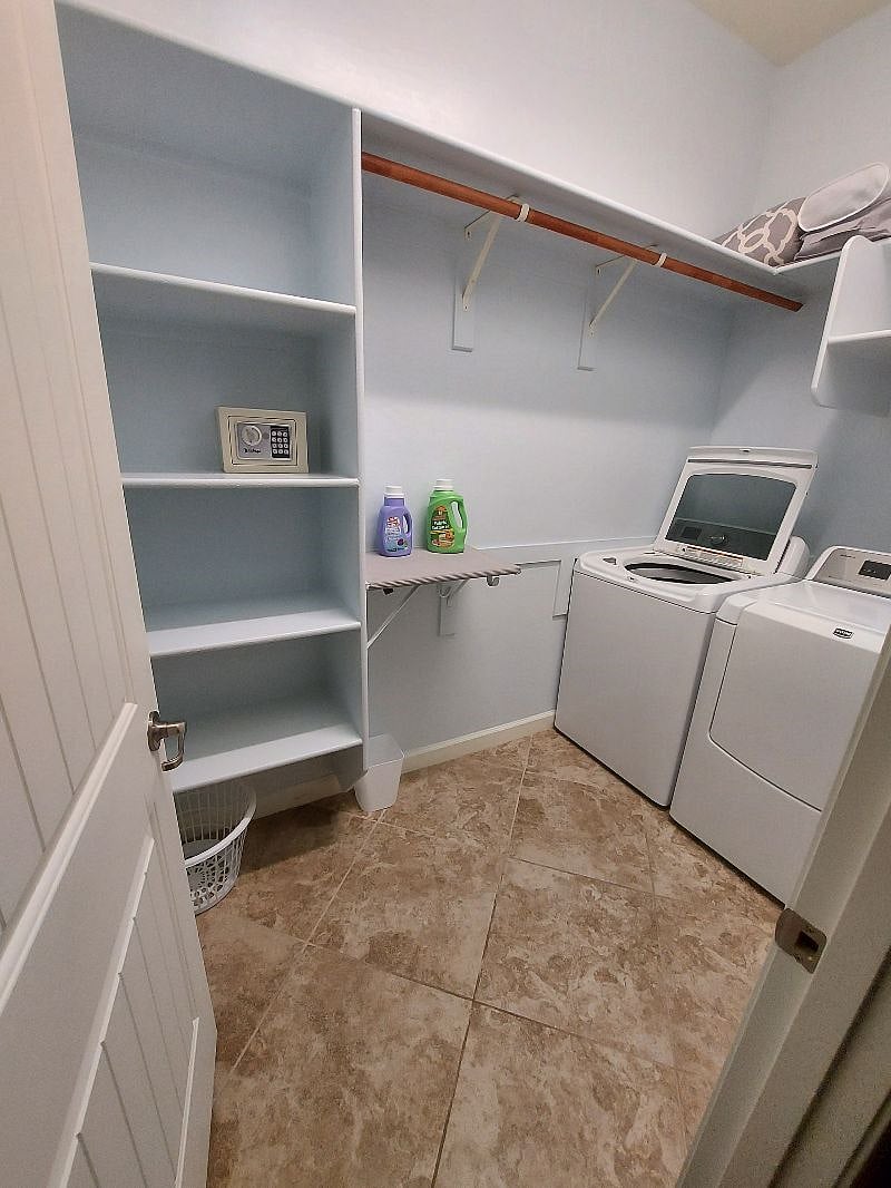 Full size washer and dryer in your walkin closet. Also a small safe, vacuum, broom and dustpan, and Mop. We have also added additional bedding and extra dishes on the upper shelves. You also have a collection of board games for your entertainment!
